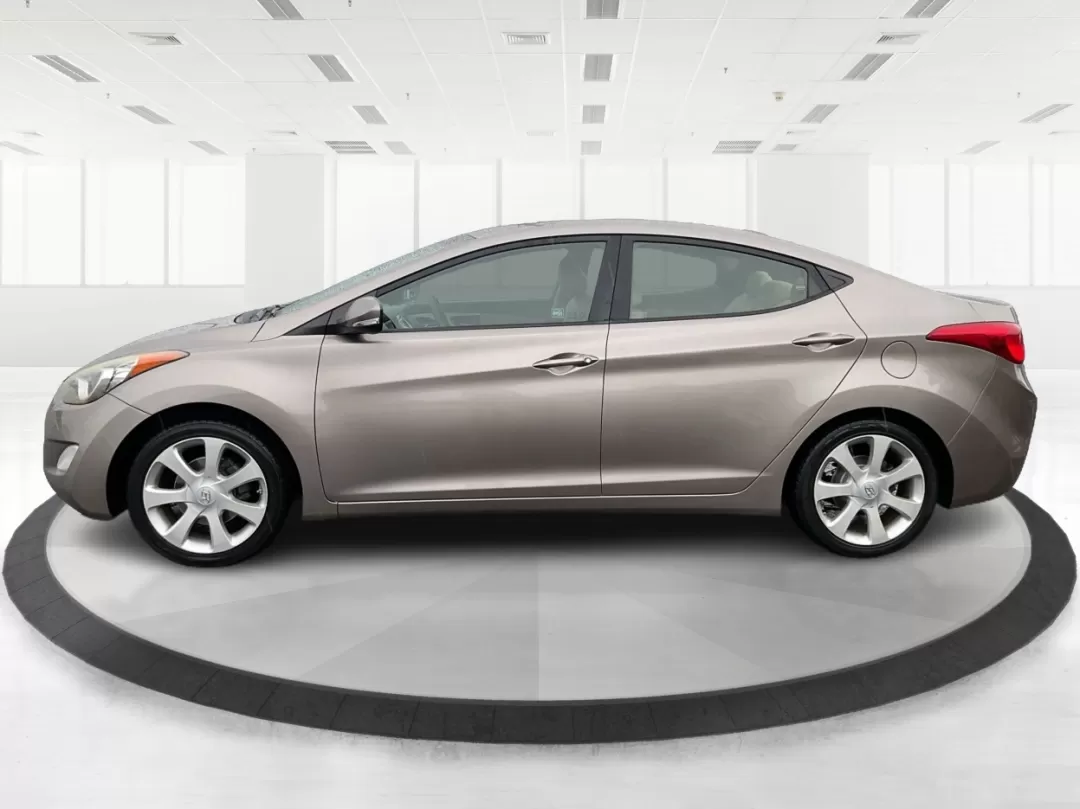 2012 Hyundai Elantra Limited (5NPDH4AE8CH) with an 1.8L I-4 DOHC engine, located at 401 Woodman Dr, Riverside, OH, 45431, (937) 908-9800, 39.760899, -84.123421 - 2012 Hyundai Elantra Limited - Photo#5