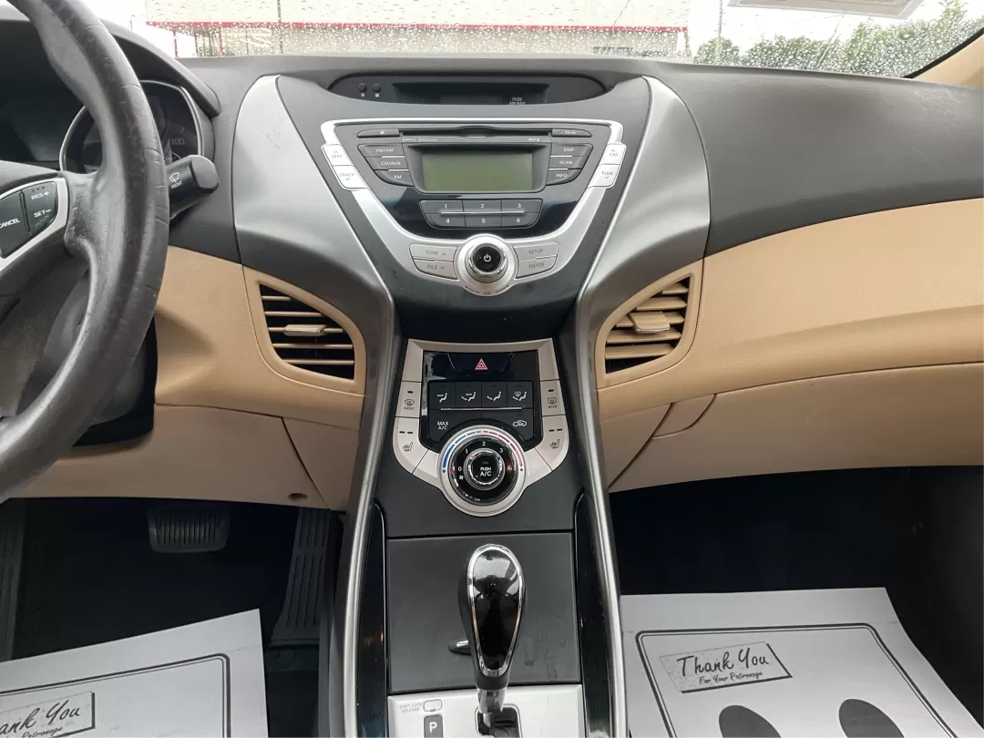 2012 Hyundai Elantra Limited (5NPDH4AE8CH) with an 1.8L I-4 DOHC engine, located at 401 Woodman Dr, Riverside, OH, 45431, (937) 908-9800, 39.760899, -84.123421 - 2012 Hyundai Elantra Limited - Photo#13