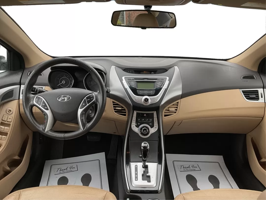 2012 Hyundai Elantra Limited (5NPDH4AE8CH) with an 1.8L I-4 DOHC engine, located at 401 Woodman Dr, Riverside, OH, 45431, (937) 908-9800, 39.760899, -84.123421 - 2012 Hyundai Elantra Limited - Photo#19