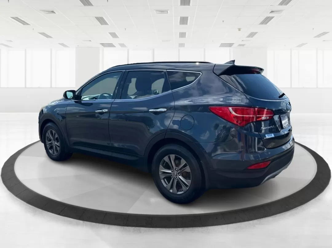 2013 Hyundai Santa Fe Sport (5XYZUDLB4DG) with an Theta II 2.4L I-4 gasoline direct injection engine, located at 401 Woodman Dr, Riverside, OH, 45431, (937) 908-9800, 39.760899, -84.123421 - 2013 Hyundai Santa Fe Sport - Photo#4