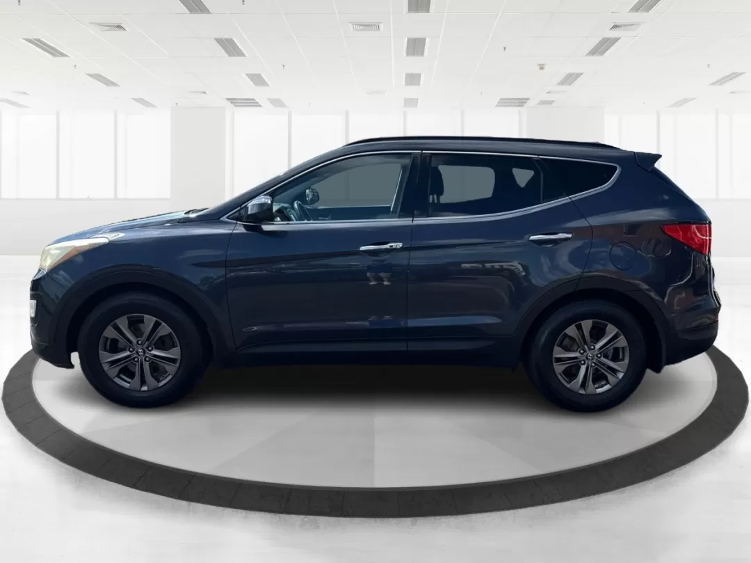 2013 Hyundai Santa Fe Sport (5XYZUDLB4DG) with an Theta II 2.4L I-4 gasoline direct injection engine, located at 401 Woodman Dr, Riverside, OH, 45431, (937) 908-9800, 39.760899, -84.123421 - 2013 Hyundai Santa Fe Sport - Photo#5