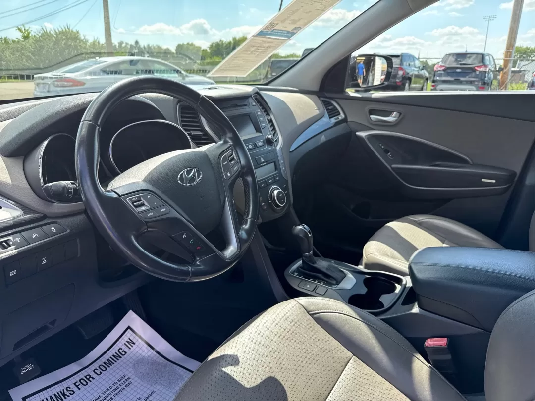 2013 Hyundai Santa Fe Sport (5XYZUDLB4DG) with an Theta II 2.4L I-4 gasoline direct injection engine, located at 401 Woodman Dr, Riverside, OH, 45431, (937) 908-9800, 39.760899, -84.123421 - 2013 Hyundai Santa Fe Sport - Photo#9