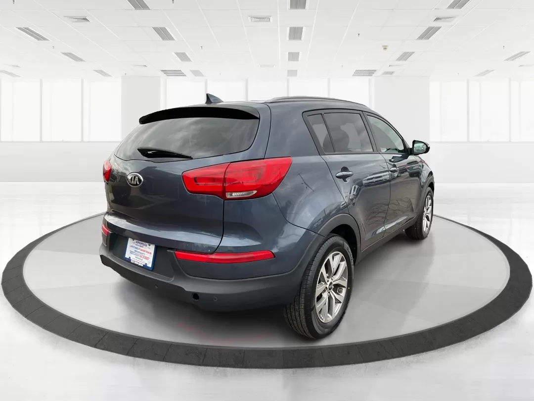 2014 Kia Sportage LX (KNDPBCAC3E7) with an 2.4L I-4 gasoline direct injection engine, located at 4508 South Dixie Dr, Moraine, OH, 45439, (937) 908-9800, 39.689976, -84.218452 - Photo#2