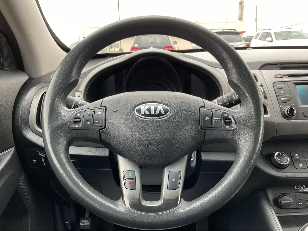 2014 Kia Sportage LX (KNDPBCAC3E7) with an 2.4L I-4 gasoline direct injection engine, located at 4508 South Dixie Dr, Moraine, OH, 45439, (937) 908-9800, 39.689976, -84.218452 - Photo#16