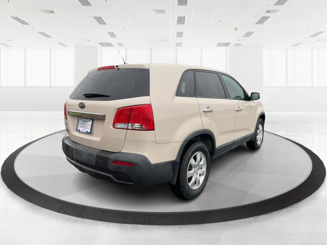 2011 Kia Sorento LX (5XYKT3A1XBG) with an 2.4L I-4 DOHC engine, located at 4508 South Dixie Dr, Moraine, OH, 45439, (937) 908-9800, 39.689976, -84.218452 - Photo#2