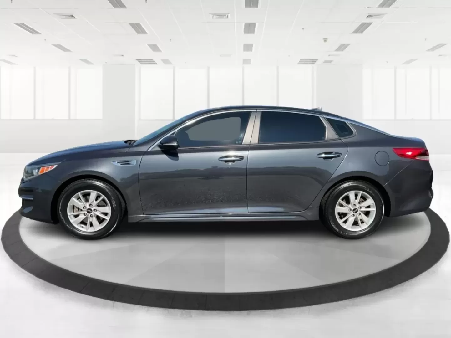 2017 Kia Optima LX (5XXGT4L37HG) with an Theta II 2.4L I-4 gasoline direct injection engine, located at 4508 South Dixie Dr, Moraine, OH, 45439, (937) 908-9800, 39.689976, -84.218452 - Discover the perfect blend of style and functionality with this 2017 Kia Optima LX, available at Advantage Car and Credit, your trusted Buy Here Pay Here dealership in Fairborn, OH. Whether you're commuting to work, shuttling the kids to school, or planning a weekend getaway, this sedan is designed - Photo#5