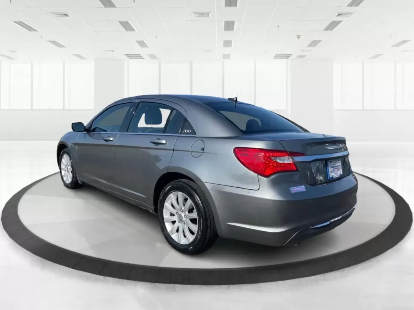 2012 Chrysler 200 Touring (1C3CCBBG5CN) with an 2.4L I-4 DOHC engine, located at 1951 S Dayton Lakeview Rd., New Carlisle, OH, 45344, (937) 908-9800, 39.890999, -84.050255 - Are you ready to elevate your driving experience? If you're seeking a reliable vehicle that perfectly balances comfort, technology, and style, look no further than the 2012 Chrysler 200 Touring sedan. This vehicle is an ideal choice for budget-conscious buyers, growing families, and anyone who wants - Photo#4