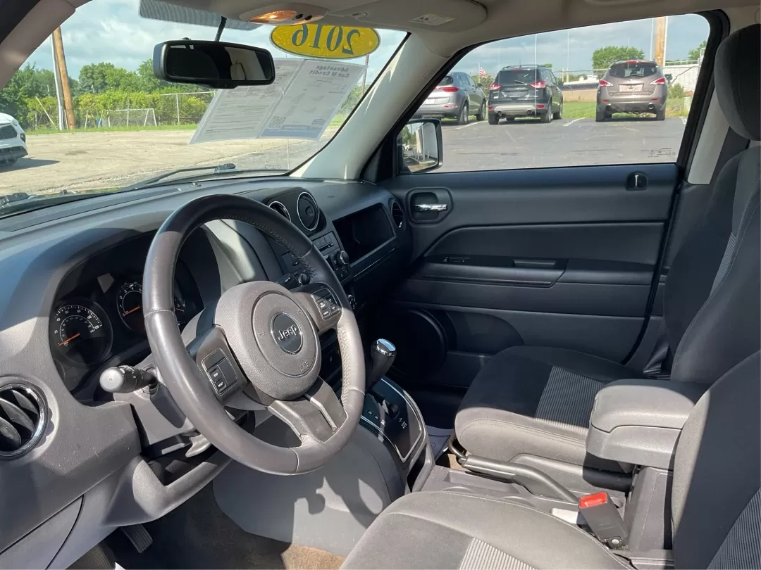 2016 Jeep Patriot Latitude (1C4NJRFB2GD) with an 2.4L I-4 DOHC engine, located at 4508 South Dixie Dr, Moraine, OH, 45439, (937) 908-9800, 39.689976, -84.218452 - Photo#9