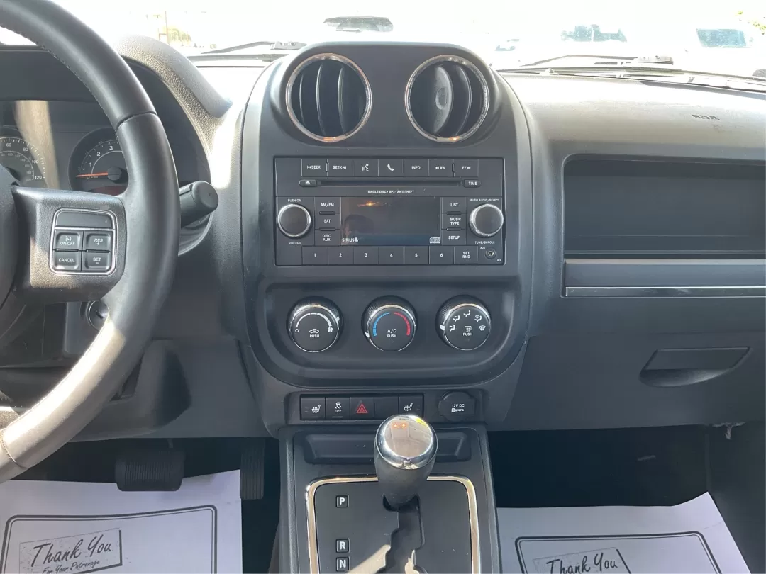 2016 Jeep Patriot Latitude (1C4NJRFB2GD) with an 2.4L I-4 DOHC engine, located at 4508 South Dixie Dr, Moraine, OH, 45439, (937) 908-9800, 39.689976, -84.218452 - Photo#13