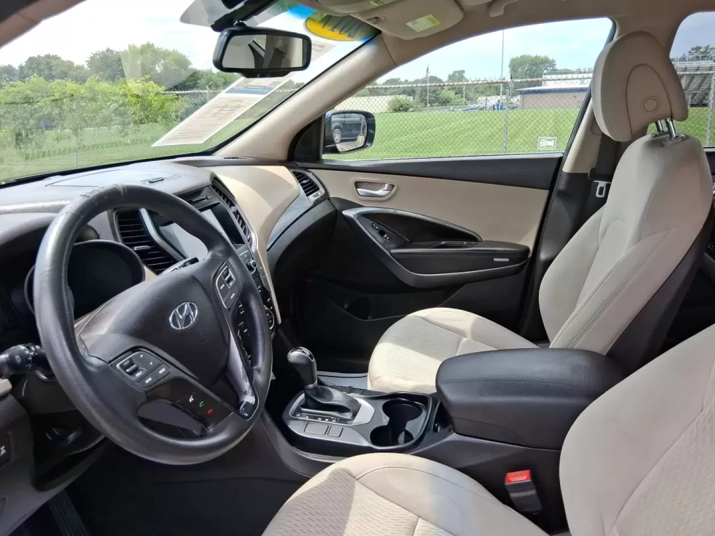 2017 Hyundai Santa Fe 2.4L (5XYZUDLB0HG) with an Theta II 2.4L I-4 gasoline direct injection engine, located at 1230 East Main St, Xenia, OH, 45385, (937) 908-9800, 39.688026, -83.910172 - **Embrace Adventure with the 2017 Hyundai Santa Fe at Advantage Car and Credit - Moraine!**<br /> <br /> Are you ready to elevate your lifestyle with a versatile vehicle that can keep up with your busy schedule? Look no further than the 2017 Hyundai Santa Fe, an SUV designed for those who love famil - Photo#9