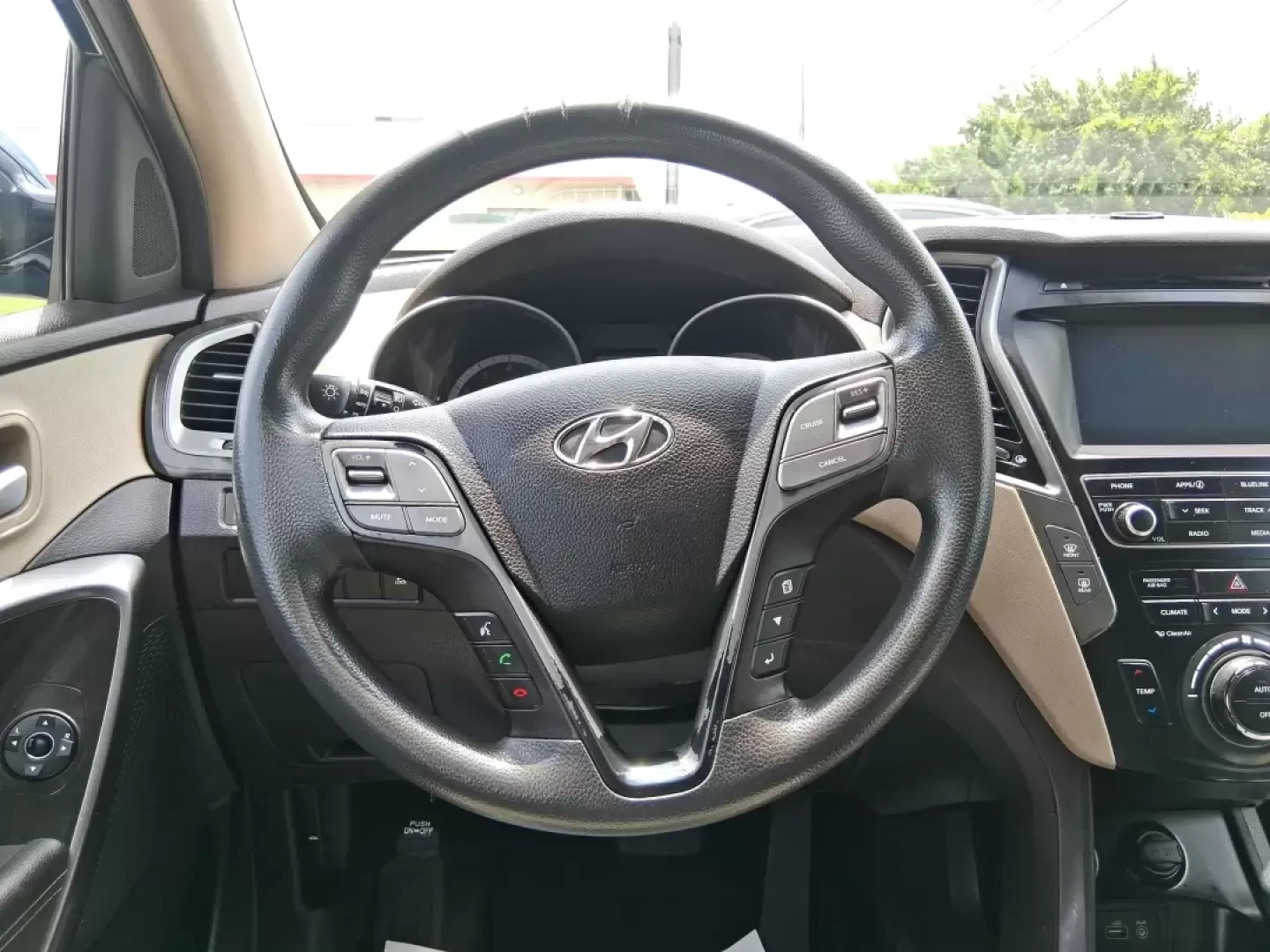 2017 Hyundai Santa Fe 2.4L (5XYZUDLB0HG) with an Theta II 2.4L I-4 gasoline direct injection engine, located at 1230 East Main St, Xenia, OH, 45385, (937) 908-9800, 39.688026, -83.910172 - **Embrace Adventure with the 2017 Hyundai Santa Fe at Advantage Car and Credit - Moraine!**<br /> <br /> Are you ready to elevate your lifestyle with a versatile vehicle that can keep up with your busy schedule? Look no further than the 2017 Hyundai Santa Fe, an SUV designed for those who love famil - Photo#16