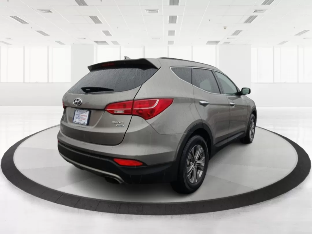 2016 Hyundai Santa Fe Sport 2.4 AWD (5XYZUDLB9GG) with an 2.4L L4 DOHC 16V engine, 6-Speed Automatic transmission, located at 1951 S Dayton Lakeview Rd., New Carlisle, OH, 45344, (937) 908-9800, 39.890999, -84.050255 - Photo#2