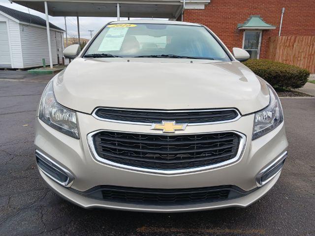 2016 Gold Chevrolet Cruze Limited 1LT Auto (1G1PE5SB0G7) with an 1.4L L4 DOHC 16V TURBO engine, 6-Speed Automatic transmission, located at 1951 S Dayton Lakeview Rd., New Carlisle, OH, 45344, (937) 908-9800, 39.890999, -84.050255 - Photo #1