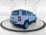 2014 Jeep Patriot Latitude (1C4NJPFB0ED) with an 2.4L I-4 DOHC engine, located at 1951 S Dayton Lakeview Rd., New Carlisle, OH, 45344, (937) 908-9800, 39.890999, -84.050255 - Photo#2
