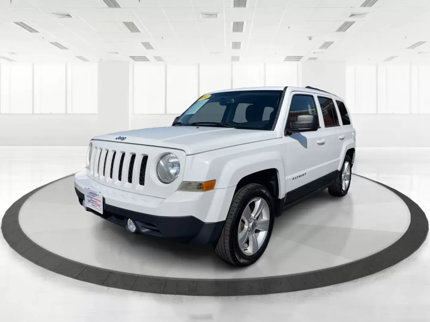 2014 Jeep Patriot Latitude (1C4NJPFB0ED) with an 2.4L I-4 DOHC engine, located at 1951 S Dayton Lakeview Rd., New Carlisle, OH, 45344, (937) 908-9800, 39.890999, -84.050255 - Photo#8