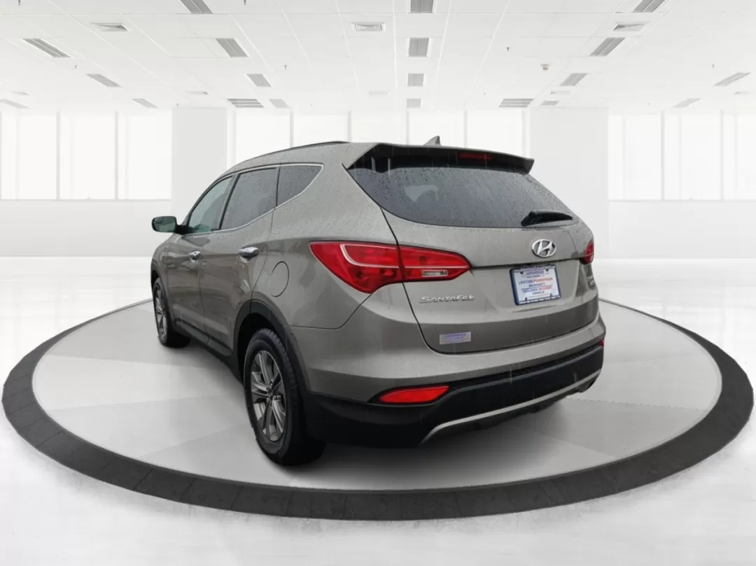 2016 Hyundai Santa Fe Sport 2.4 AWD (5XYZUDLB9GG) with an 2.4L L4 DOHC 16V engine, 6-Speed Automatic transmission, located at 1951 S Dayton Lakeview Rd., New Carlisle, OH, 45344, (937) 908-9800, 39.890999, -84.050255 - Photo#4