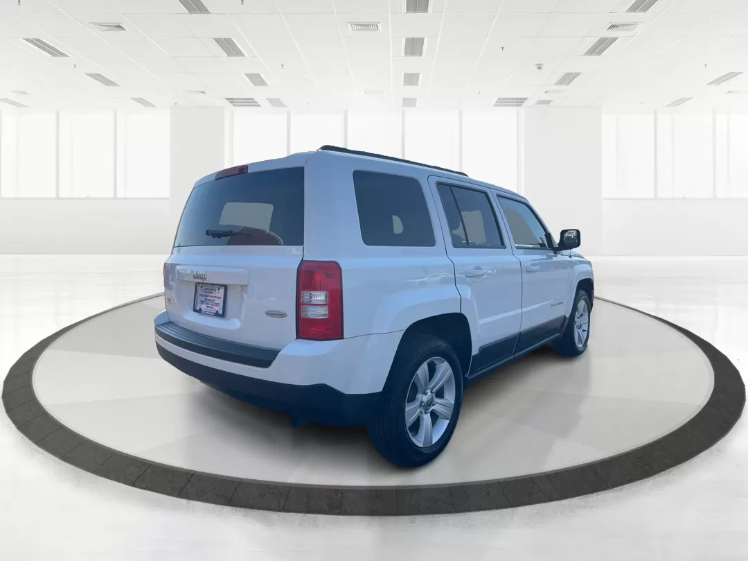 2014 Jeep Patriot Latitude (1C4NJPFB0ED) with an 2.4L I-4 DOHC engine, located at 1951 S Dayton Lakeview Rd., New Carlisle, OH, 45344, (937) 908-9800, 39.890999, -84.050255 - Photo#2