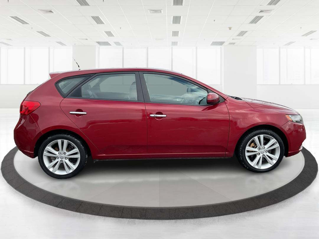 2011 Spicy Red Metallic Kia Forte 5-Door SX (KNAFW5A33B5) with an 2.4L L4 DOHC 16V engine, located at 1230 East Main St, Xenia, OH, 45385, (937) 908-9800, 39.688026, -83.910172 - 2011 Kia Forte 5-Door SX - Photo#1