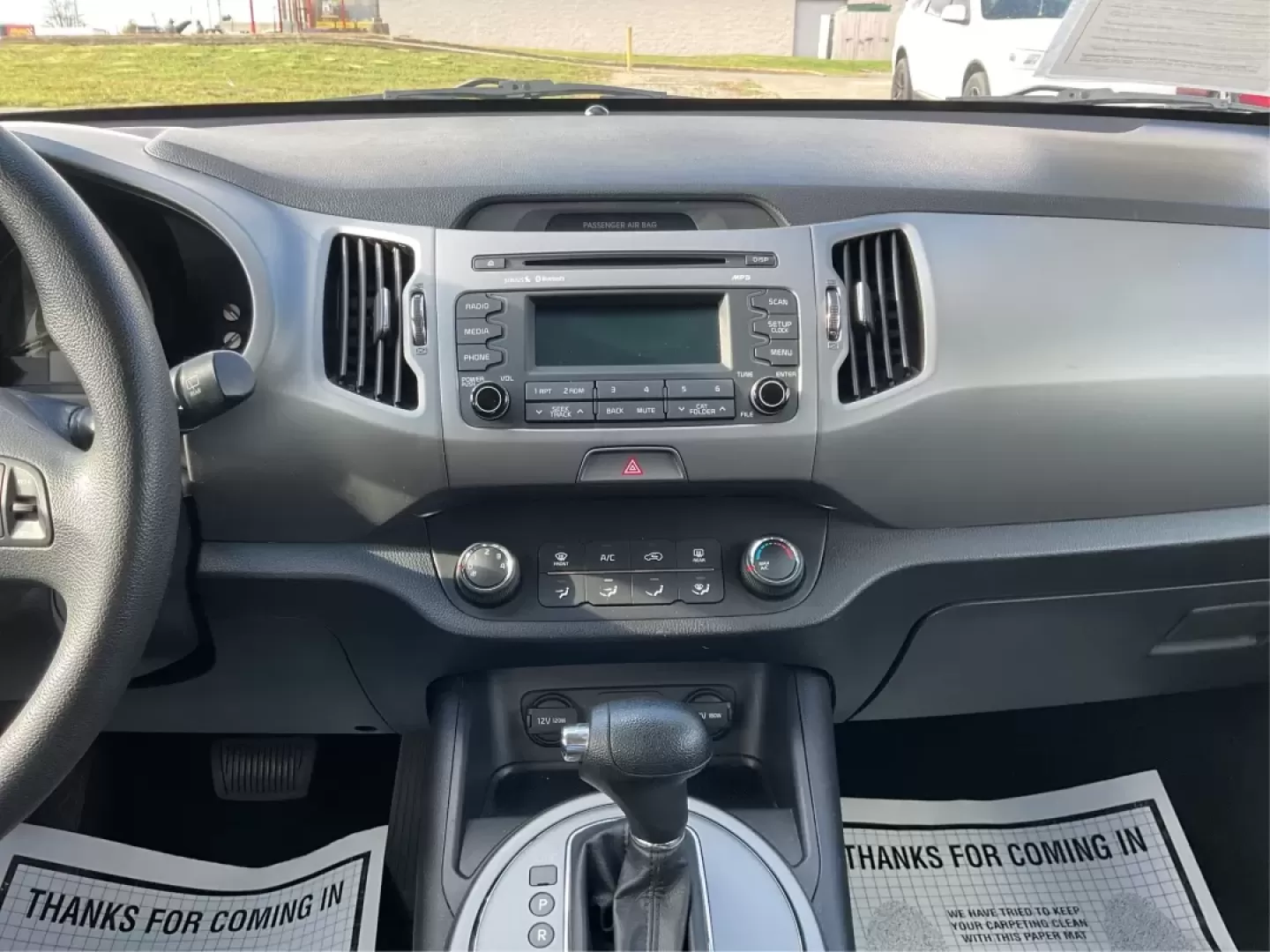 2015 Kia Sportage LX (KNDPB3AC1F7) with an Other engine, located at 1951 S Dayton Lakeview Rd., New Carlisle, OH, 45344, (937) 908-9800, 39.890999, -84.050255 - Are you looking for a versatile vehicle that can handle your family's daily adventures while also being budget-friendly? Look no further than this 2015 Kia Sportage LX, now available at Advantage Car and Credit in Fairborn, OH. This stylish crossover SUV is perfect for growing families, weekend geta - Photo#12