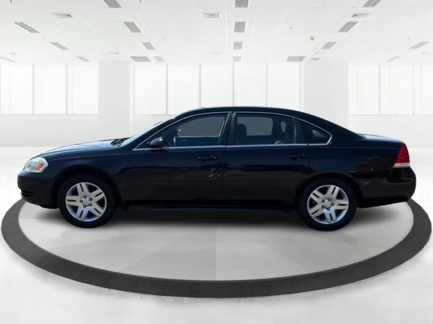 2014 Chevrolet Impala Limited LT (2G1WB5E3XE1) with an 3.6L V-6 gasoline direct injection engine, located at 1951 S Dayton Lakeview Rd., New Carlisle, OH, 45344, (937) 908-9800, 39.890999, -84.050255 - Are you ready for your next adventure, whether it's a family road trip, a daily commute, or simply running errands around Fairborn? The 2014 Chevrolet Impala Limited LT is the perfect sedan to elevate your driving experience. With its stylish black exterior and reliable performance, this vehicle is - Photo#5