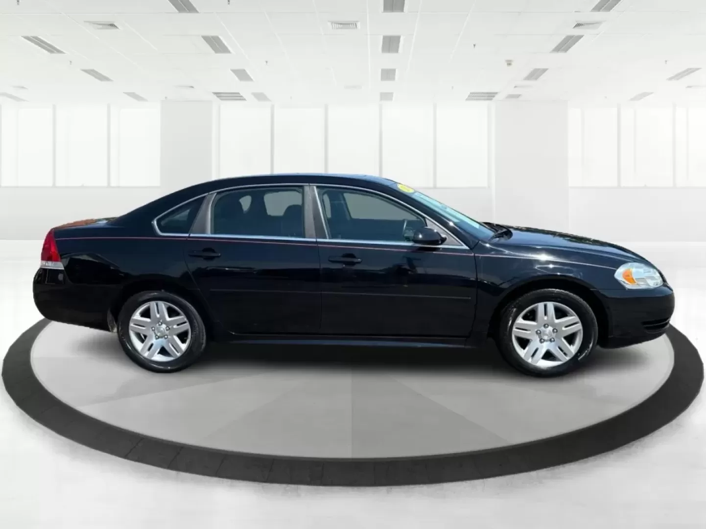 2014 Chevrolet Impala Limited LT (2G1WB5E3XE1) with an 3.6L V-6 gasoline direct injection engine, located at 1951 S Dayton Lakeview Rd., New Carlisle, OH, 45344, (937) 908-9800, 39.890999, -84.050255 - Are you ready for your next adventure, whether it's a family road trip, a daily commute, or simply running errands around Fairborn? The 2014 Chevrolet Impala Limited LT is the perfect sedan to elevate your driving experience. With its stylish black exterior and reliable performance, this vehicle is - Photo#1