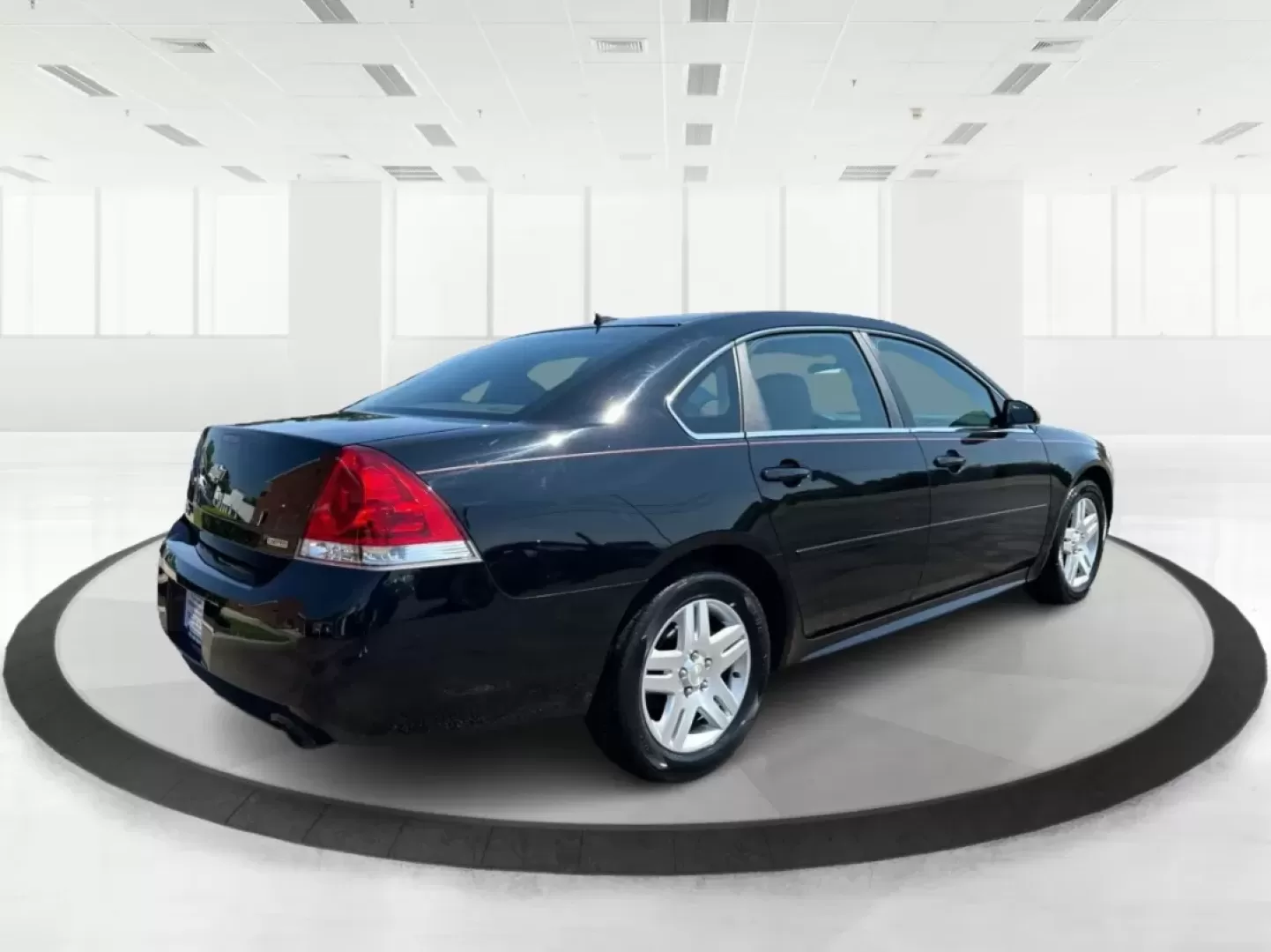 2014 Chevrolet Impala Limited LT (2G1WB5E3XE1) with an 3.6L V-6 gasoline direct injection engine, located at 1951 S Dayton Lakeview Rd., New Carlisle, OH, 45344, (937) 908-9800, 39.890999, -84.050255 - Are you ready for your next adventure, whether it's a family road trip, a daily commute, or simply running errands around Fairborn? The 2014 Chevrolet Impala Limited LT is the perfect sedan to elevate your driving experience. With its stylish black exterior and reliable performance, this vehicle is - Photo#2