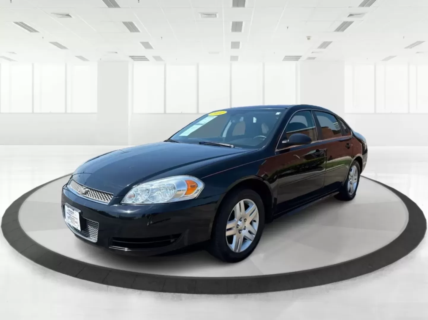 2014 Chevrolet Impala Limited LT (2G1WB5E3XE1) with an 3.6L V-6 gasoline direct injection engine, located at 1951 S Dayton Lakeview Rd., New Carlisle, OH, 45344, (937) 908-9800, 39.890999, -84.050255 - Are you ready for your next adventure, whether it's a family road trip, a daily commute, or simply running errands around Fairborn? The 2014 Chevrolet Impala Limited LT is the perfect sedan to elevate your driving experience. With its stylish black exterior and reliable performance, this vehicle is - Photo#8