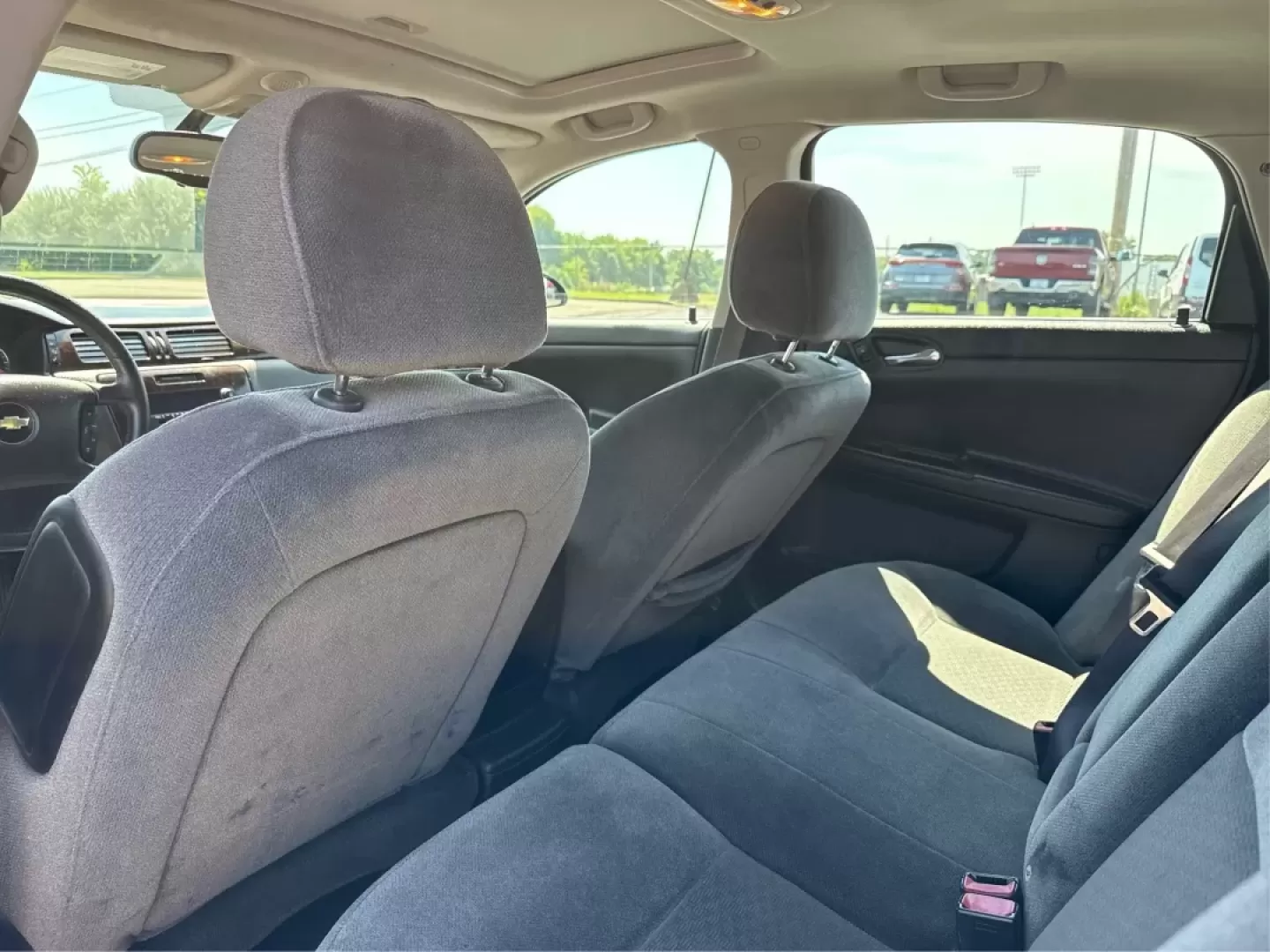 2014 Chevrolet Impala Limited LT (2G1WB5E3XE1) with an 3.6L V-6 gasoline direct injection engine, located at 1951 S Dayton Lakeview Rd., New Carlisle, OH, 45344, (937) 908-9800, 39.890999, -84.050255 - Are you ready for your next adventure, whether it's a family road trip, a daily commute, or simply running errands around Fairborn? The 2014 Chevrolet Impala Limited LT is the perfect sedan to elevate your driving experience. With its stylish black exterior and reliable performance, this vehicle is - Photo#10