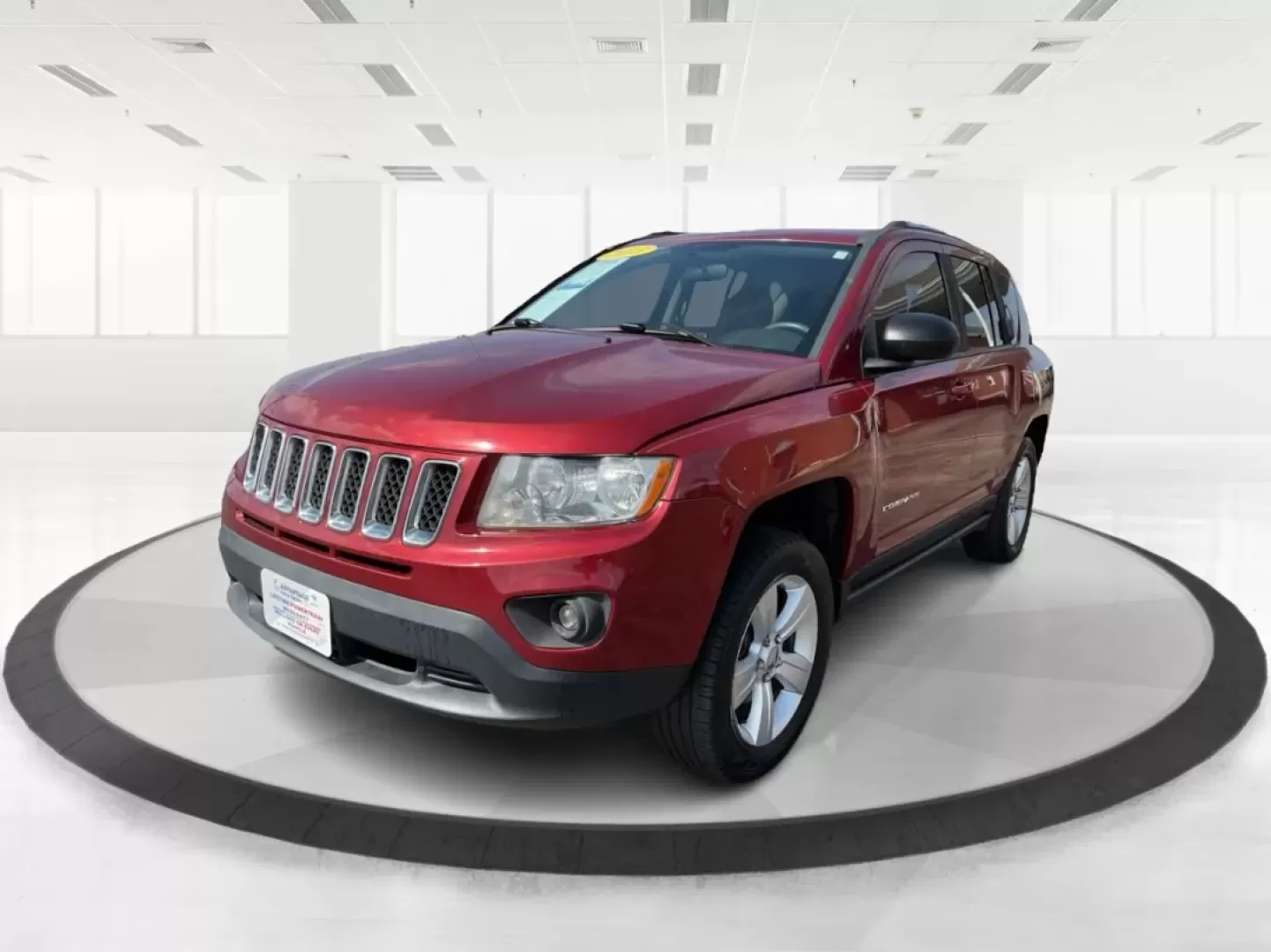 2013 Jeep Compass Latitude (1C4NJDEB6DD) with an 2.4L I-4 DOHC engine, located at 401 Woodman Dr, Riverside, OH, 45431, (937) 908-9800, 39.760899, -84.123421 - Are you ready to elevate your adventures and embrace a lifestyle filled with exploration? The 2013 Jeep Compass Latitude is the perfect companion for those who value versatility and comfort, making it an ideal choice for weekend getaways or daily commutes. This rugged yet refined SUV is now availabl - Photo#7