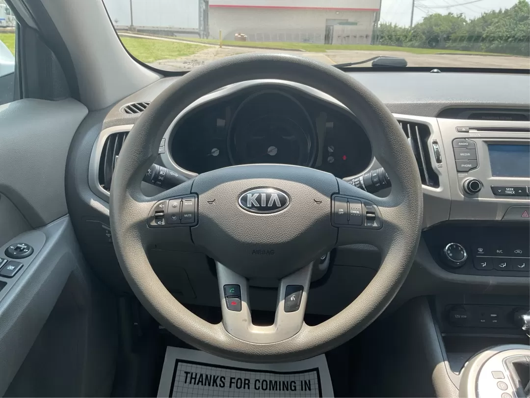2016 Kia Sportage LX (KNDPBCACXG7) with an Theta II 2.4L I-4 gasoline direct injection engine, located at 401 Woodman Dr, Riverside, OH, 45431, (937) 908-9800, 39.760899, -84.123421 - Photo#16